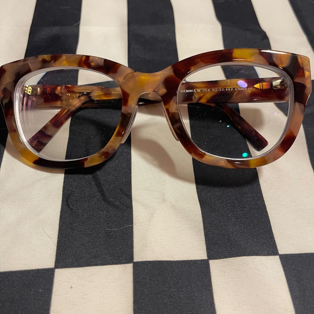 Warby Parker pink tortoise glasses